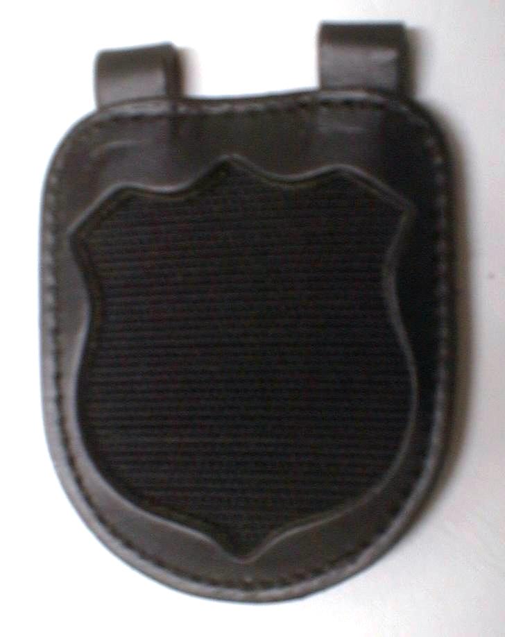 Badge holder (rough velcro) is worn with chainette